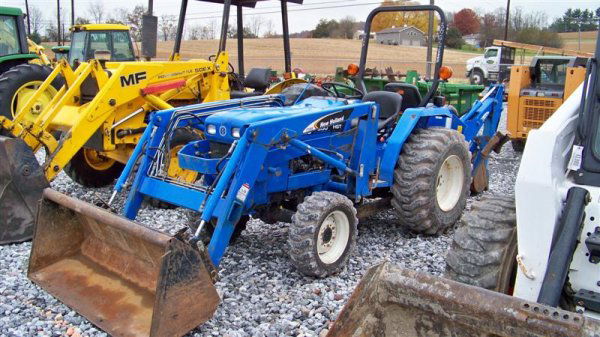 1257 New Holland TC30 4x4 Tractor Loader Backhoe Lot 1257