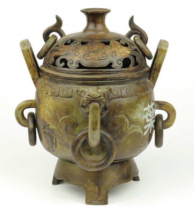 AN ANTIQUE CARVED STONE INCENSE BURNER Lot 113