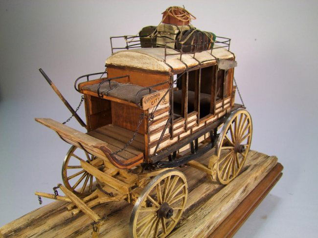 Hand carved Stagecoach By Oscar M. Cortes : Lot 228