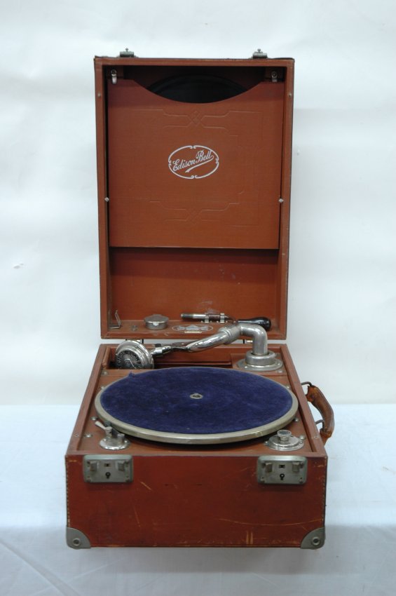 An Edison Bell Portable Phonograph With 8 Records Lot 134