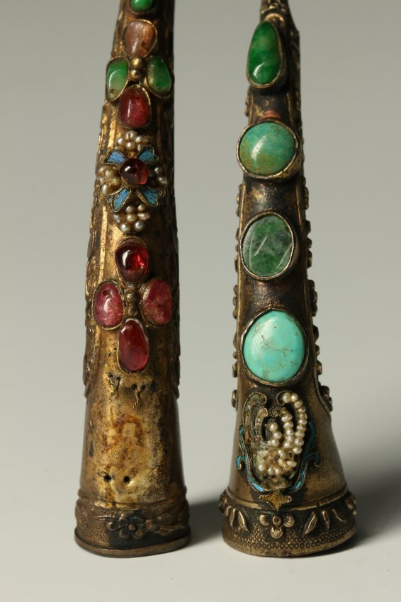 TWO 19TH CENTURY CHINESE SILVER NAIL GUARDS : Lot 149