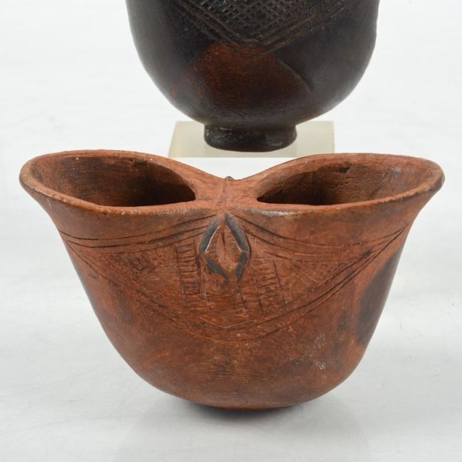(2) African tribal carved wood drinking vessels Lot 45