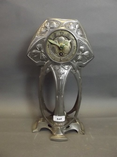A C19th Continental Art Nouveau pewter mantle clock, Lot 848