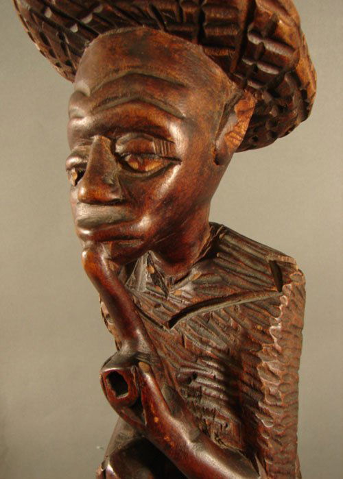 3211 Haitian Carved Wood Sculpture, man with pipe. 26 Lot 3211