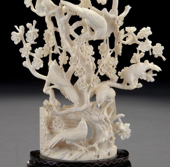 58 (2) Chinese carved ivory statues Lot 58