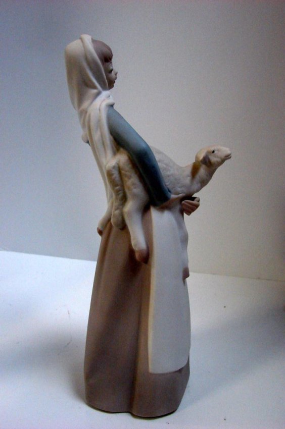 lladro woman with sheep
